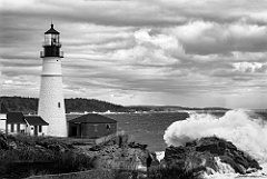 Great Wave Breaks by Portland Head Lighthouse in Maine -BW